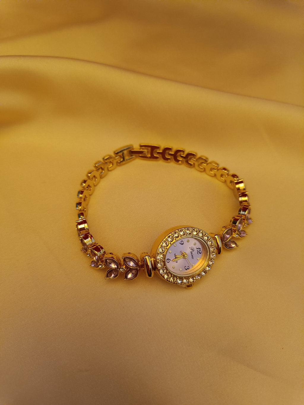 "Blossom" - Elegante Schmuckuhr mit roséfarbenen Kristallen