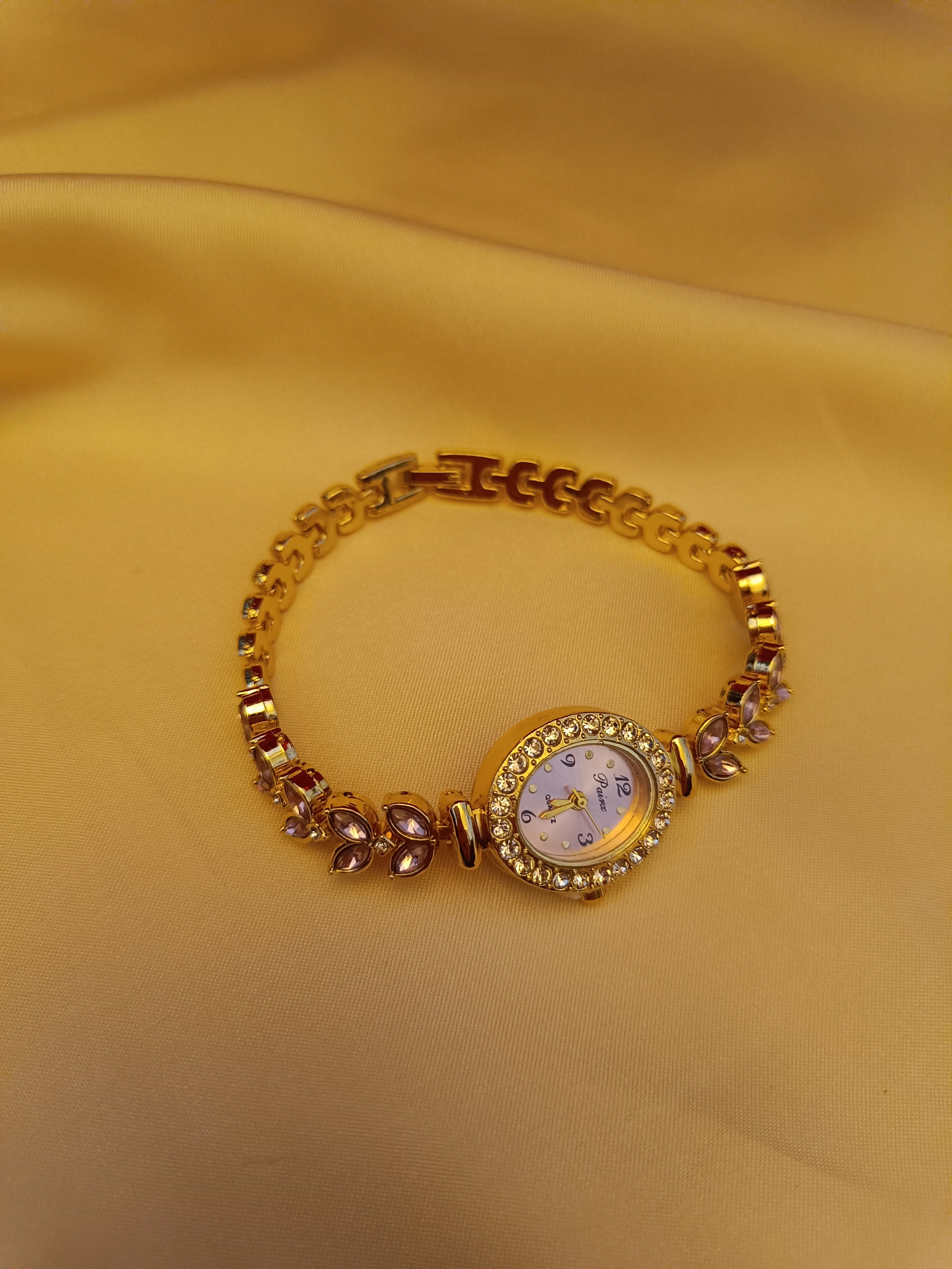 "Blossom" - Elegante Schmuckuhr mit roséfarbenen Kristallen