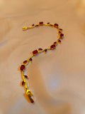"Vine" - Elegantes Armband in Gold mit roten Kristallen