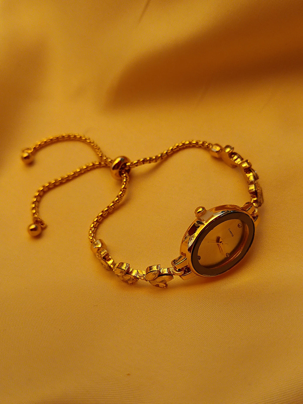 "Crystal" - Elegante Damenuhr in Gold mit Kristallblüten