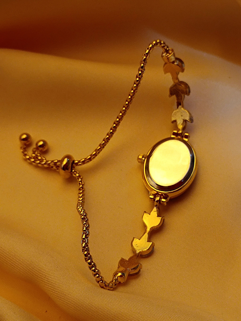 "Crystal" - Elegante Damenuhr in Gold mit Kristallblüten