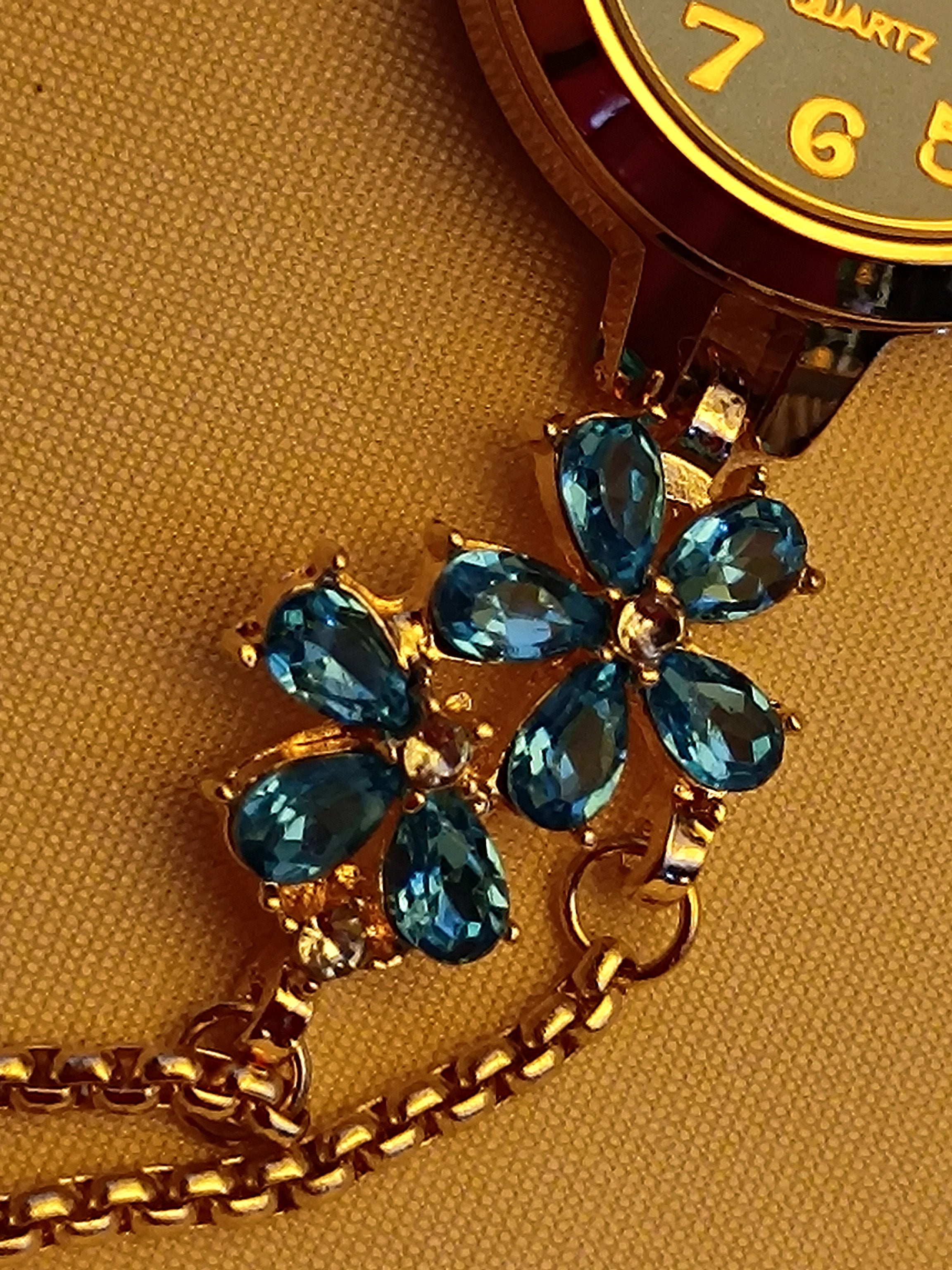 "Turquoise" - elegante Armbanduhr mit blauen Kristallblüten